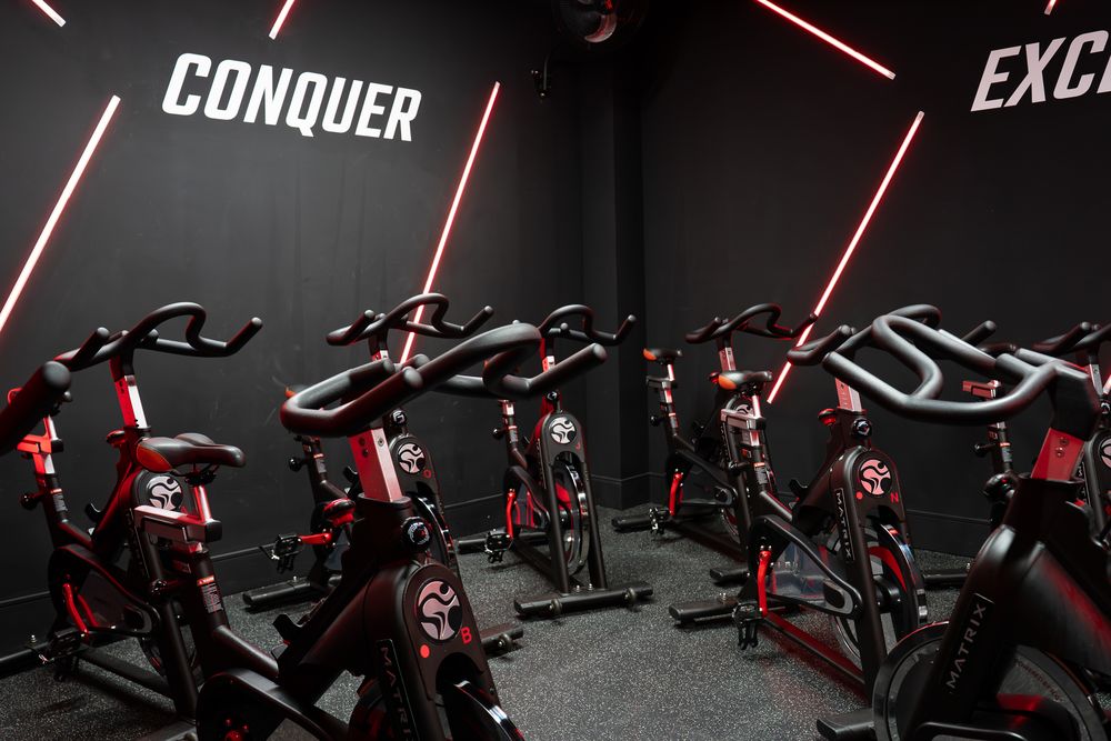 ACE spin studio with red neon lighting